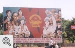 Plakaty propagandowe na ulicach Hue